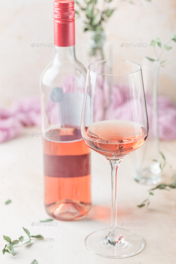 Glass and bottle of rose wine Stock Photo by ipolly80 PhotoDune